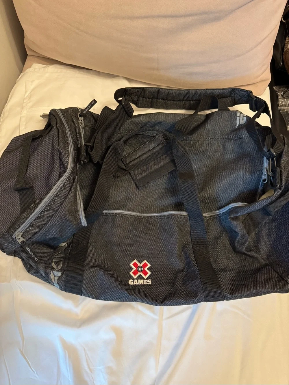 Dakine Black Duffel Bag with X Games Patch